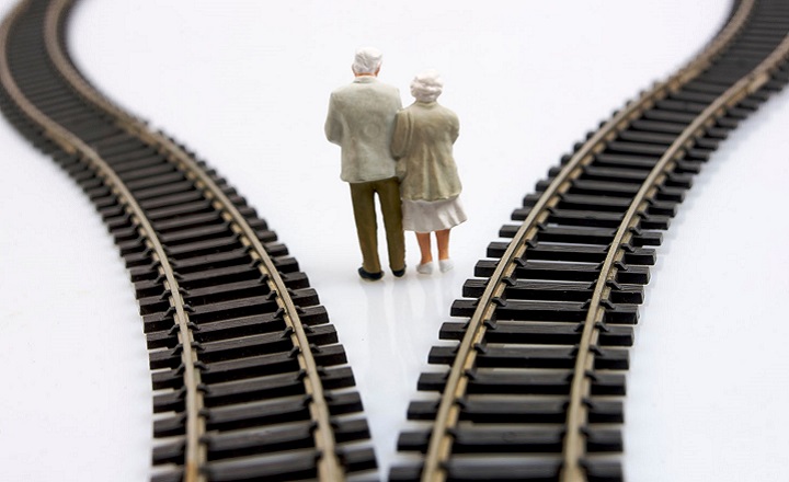 Graphic of pensioners between railway tracks